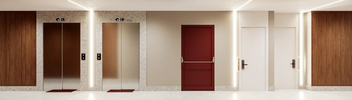 Hall dos elevadores com acabamento em quartzito e madeira