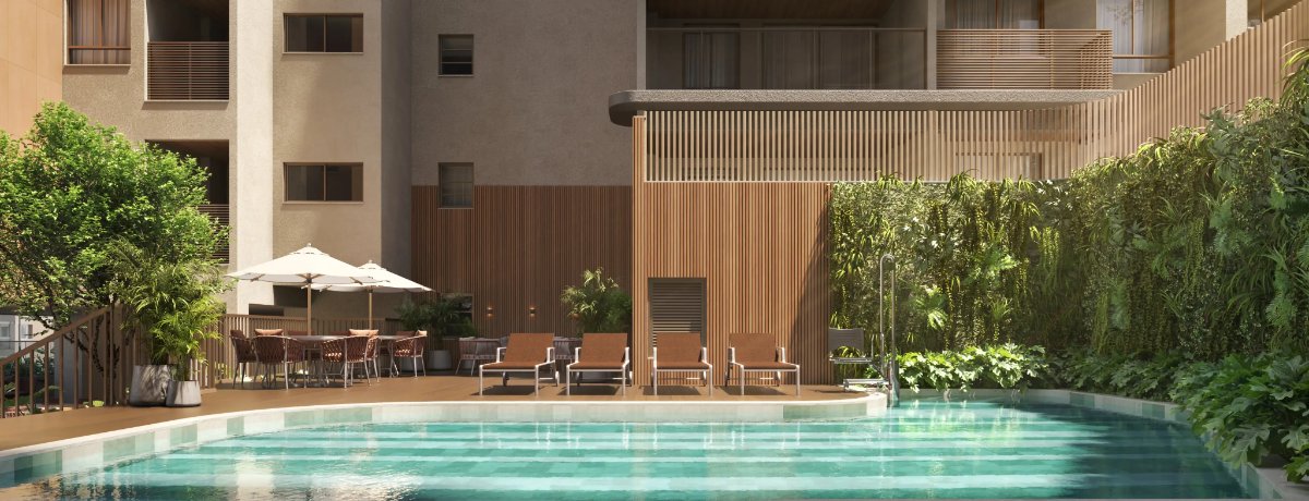 Piscina externa com deck molhado e paisagismo tropical